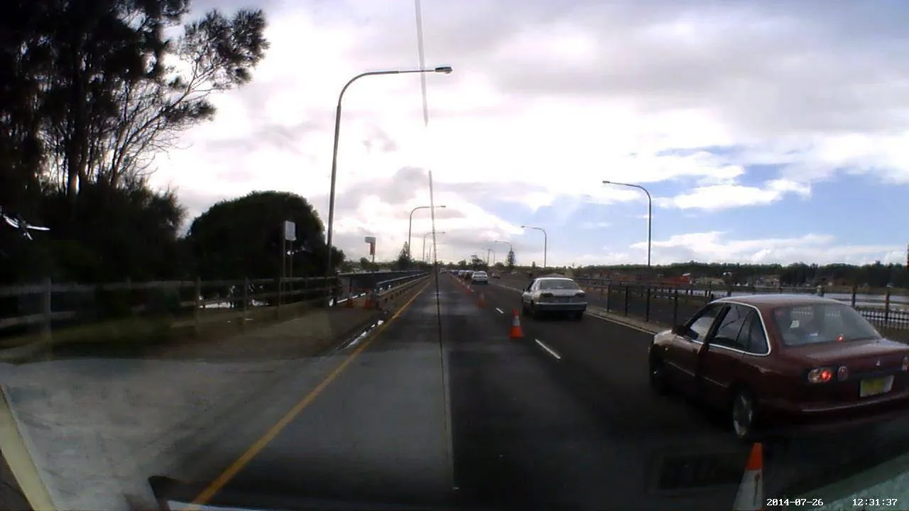 Dash camera still from an SSTC vehicle on a bridge